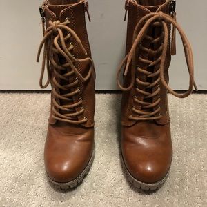 Brown heeled lace up boots
